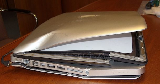 Severely crushed MacBook Pro - not mine, fortunately!