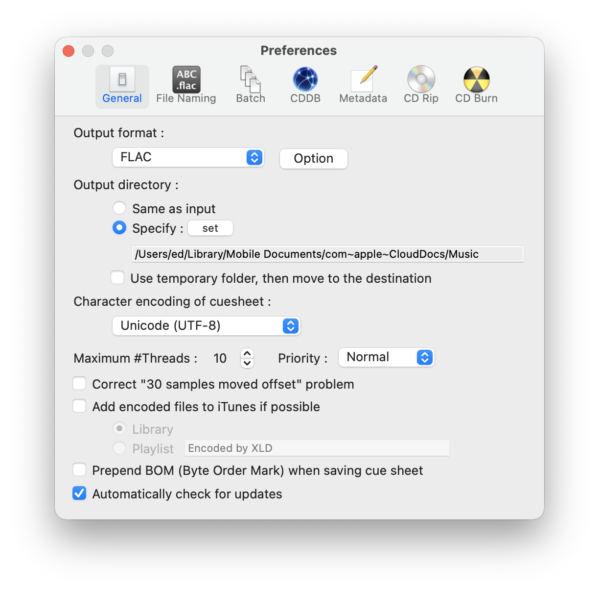 XLD Settings, General preferences window, showing output format options with FLAC selected, Output directory set to a custom location